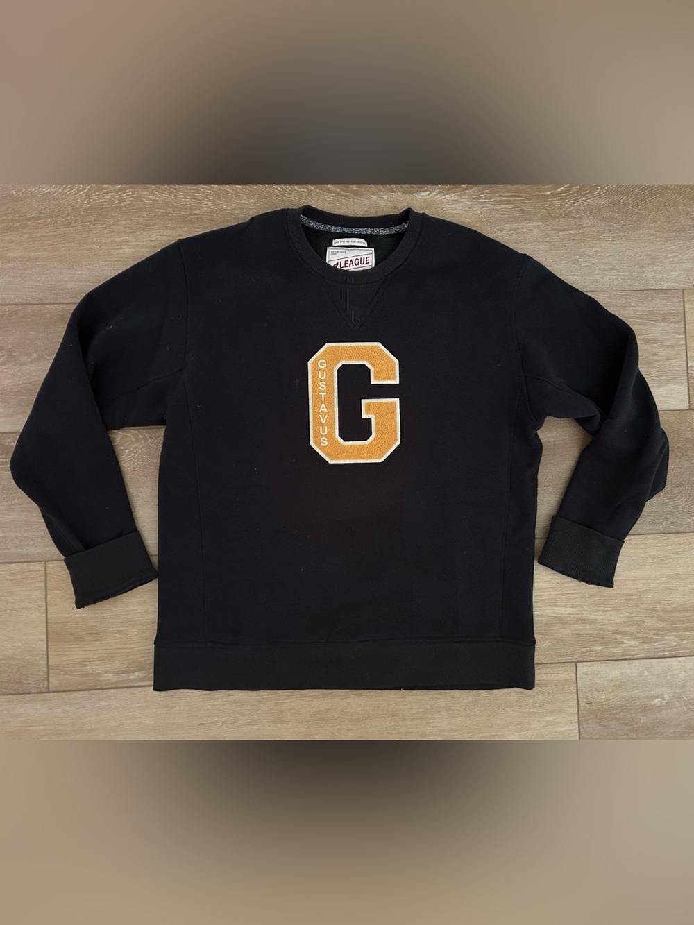Gustavus Black Crewneck Sweatshirt with Gold Varsity Letter “G”